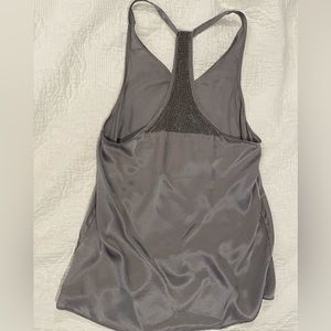 Perfect summer top! Banana Republic gray silk racerback with beading detail